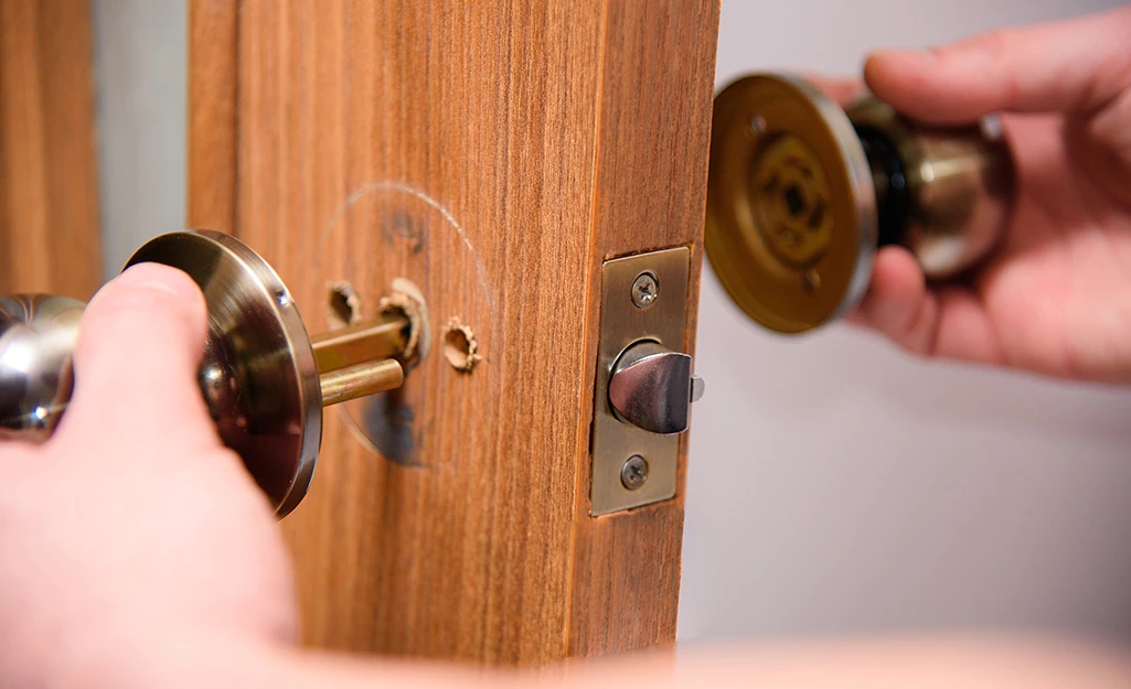 How to remove the door knob lock?